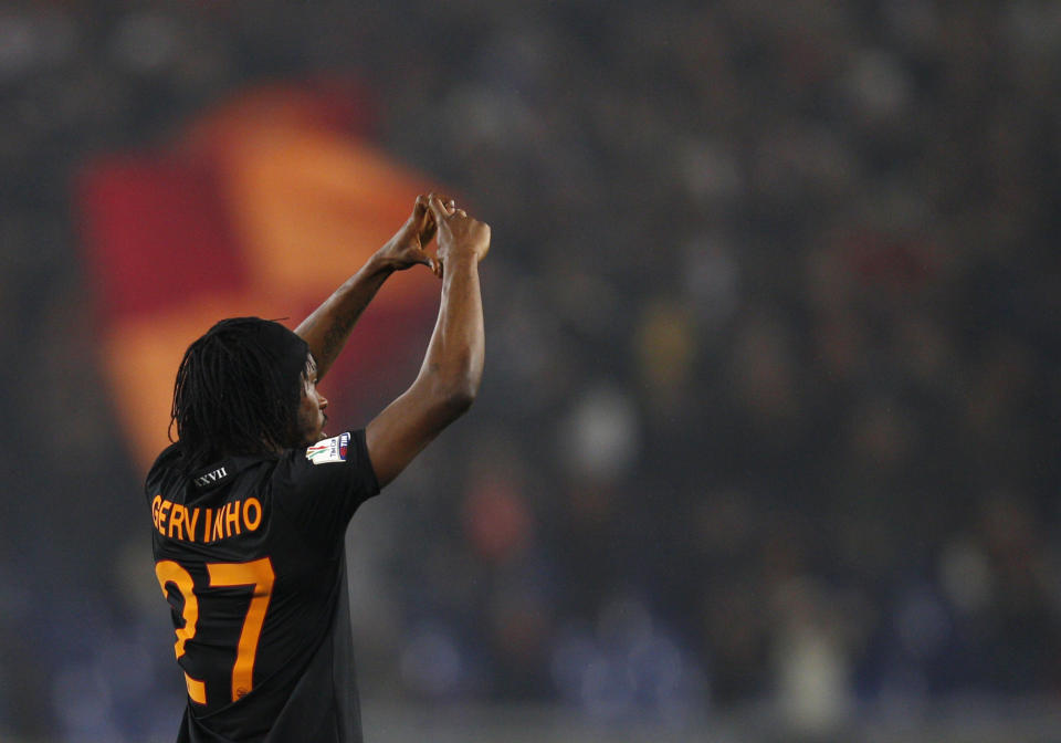 AS Roma forward Gervinho of Ivory Coast celebrates after scoring during an Italian Cup, semifinal first leg match, between AS Roma and Napoli at Rome's Olympic stadium, Wednesday, Feb. 5, 2014. (AP Photo/Alessandra Tarantino)
