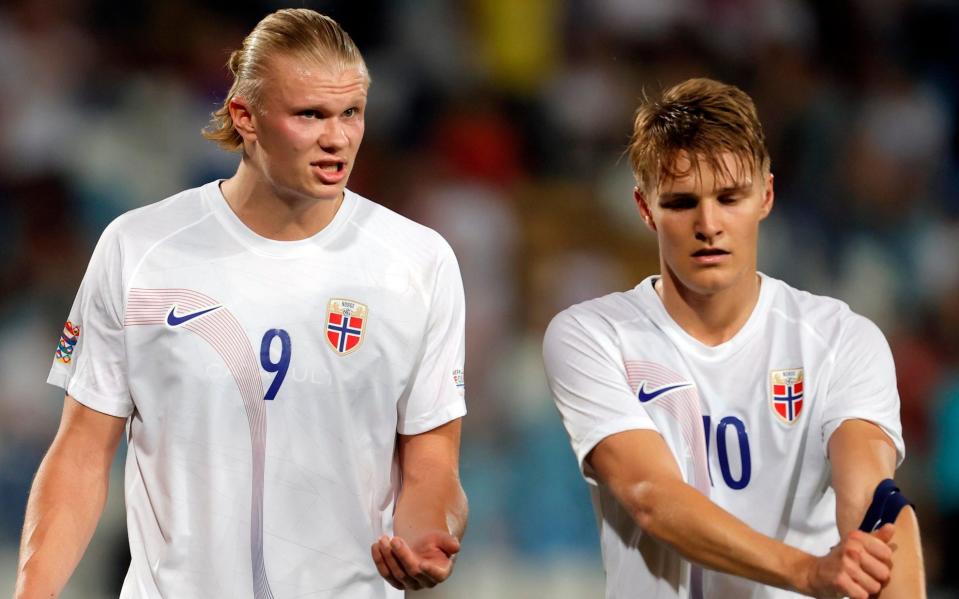 Erling Haaland talks to Martin Odegaard during the UEFA Nations League League B Group 4 match between Serbia and Norway at Stadion Rajko Mitic on June 2, 2022 in Belgrade, Serbia - Getty Images/Pedja Milosavljevic