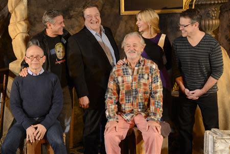 Cast members (L-R) Bob Balaban, George Clooney, John Goodman, Bill Murray, Cate Blanchett, Matt Damon and Grant Heslov are pictured during a photo call for the film "The Monuments Men" held in Beverly Hills January 16, 2014. REUTERS/Phil McCarten