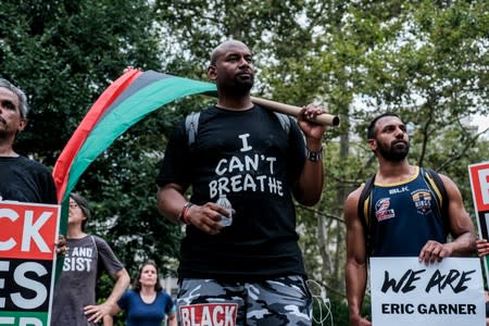 Protesters march and rally on the fifth anniversary of the death of Eric Garner in New York