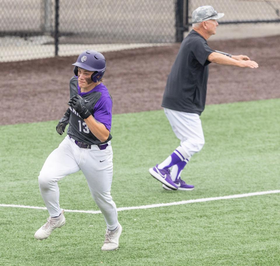 Jackson's Wyatt Fether heads for home plate to score in the first inning against Medina at Munson Stadium Saturday , May 4, 2024.