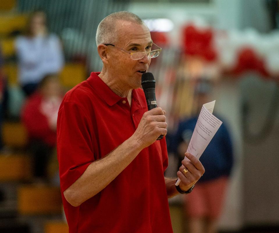 Hudson High School girls varsity basketball head coach Marty Murphy speaks to seniors on Senior Night, Feb. 10, 2023.