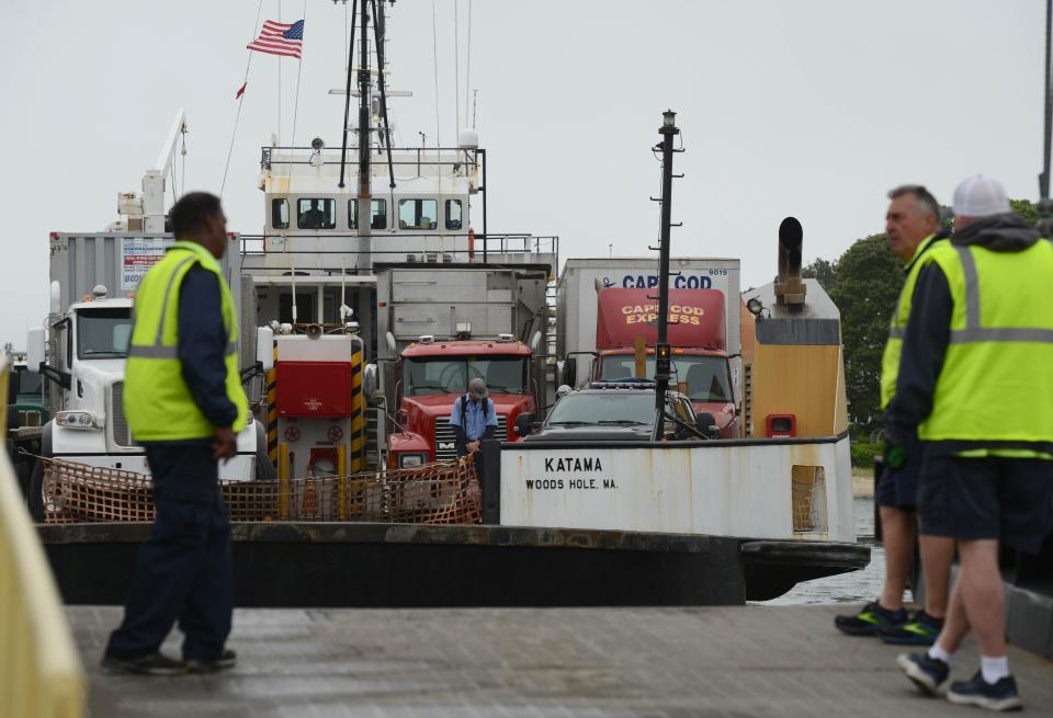 The Steamship Authority freight boat Katama navigates the busy Hyannis Inner Harbor as it backs into its slip with a full ship of trucks from Nantucket on May 27, 2022. Steve Heaslip/Cape Cod Times