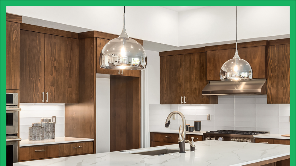 a kitchen with a bar stools