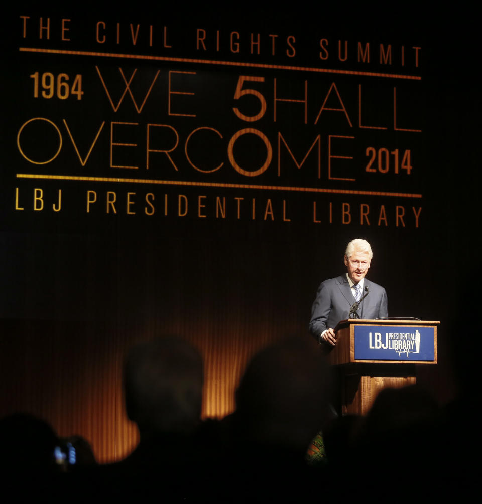 Former President Bill Clinton speaks during the Civil Rights Summit on Wednesday, April 9, 2014, in Austin, Texas. Clinton is using the 50th anniversary of the Civil Rights Act to criticize efforts in several states to create new restrictions for voters. (AP Photo/Jack Plunkett)
