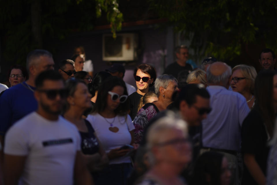 Supporters of former Slovak Prime Minister and head of leftist SMER - Social Democracy party Robert Fico attend an election rally in Michalovce, Slovakia, Wednesday, Sept. 6, 2023. Fico, whose party is favored to win Slovakia’s early parliamentary election this month plans to reverse the country’s military and political support for neighboring Ukraine in a direct challenge to the European Union and NATO, if he returns to power. (AP Photo/Petr David Josek)