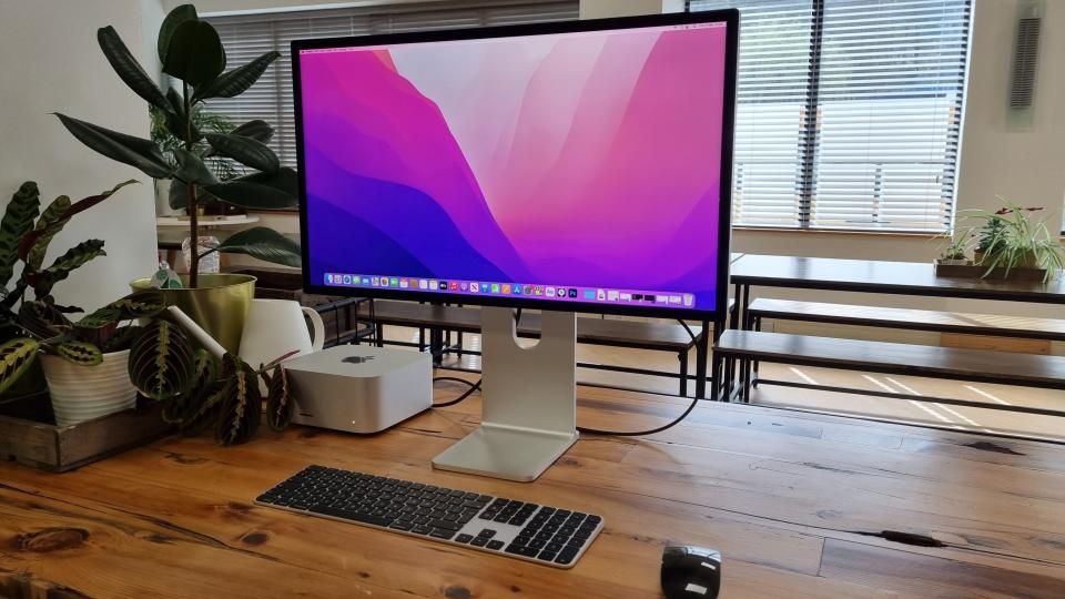 Studio Display on wooden desk