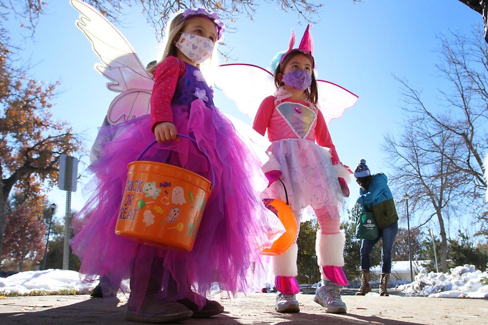 Trick-or-treaters wait patiently before entering The Farm at Lee Martinez Park for Treatsylvania in this file photo. Kids were given treat bags, enjoyed a hay bale maze and got to walk through the event's not-so-spooky barn.