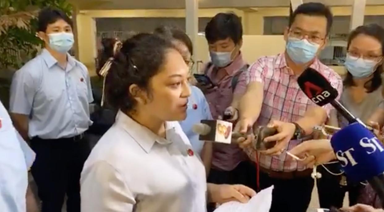 Workers' Party Raeesah Khan speaking to reporters at Compassvale Link on the night of 5 July 2020. (SCREENCAP: Yahoo News Singapore)