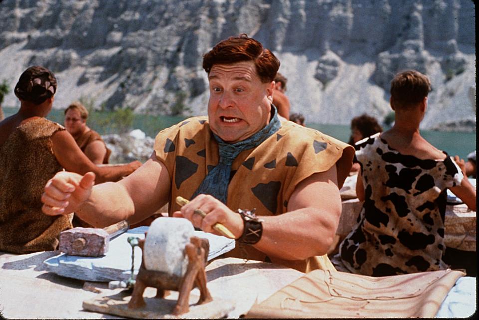 John Goodman takes on the iconic role of prehistoric guy Fred Fredstone in 1994's live-action "The Flintstones."