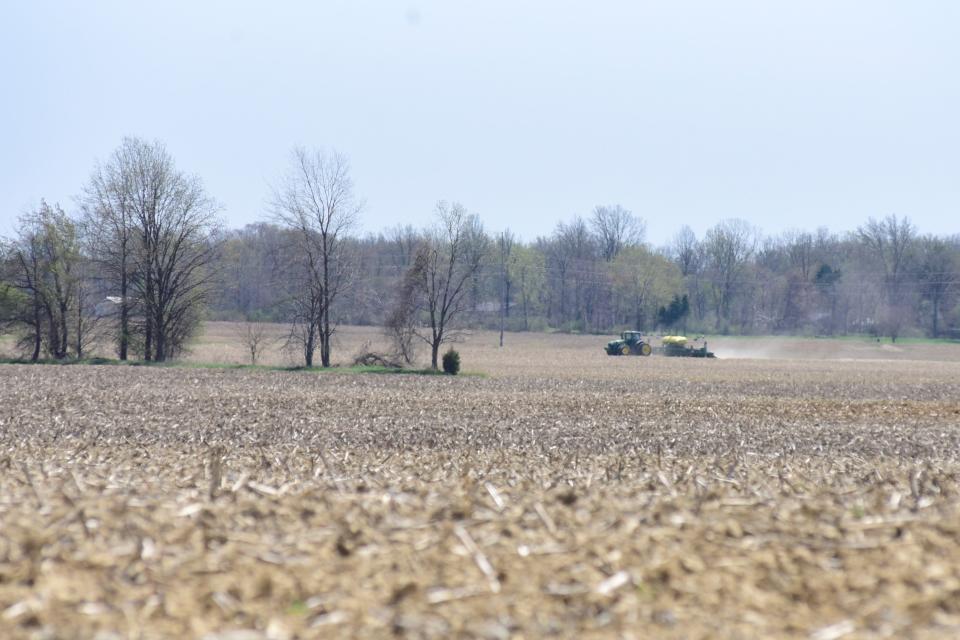 A farmer plants crops Thursday afternoon in Crawford County.
