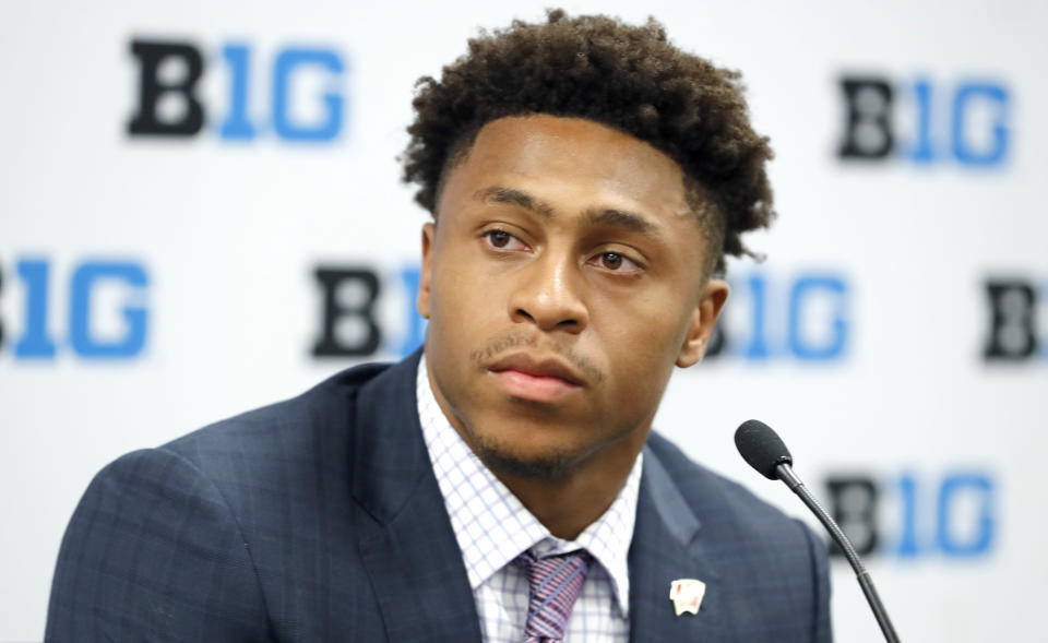 Wisconsin running back Jonathan Taylor listens to a question during the Big Ten Conference NCAA college football media days Friday, July 19, 2019, in Chicago. (AP Photo/Charles Rex Arbogast)