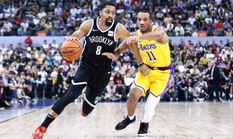 Spencer Dinwiddie drives to the rim.