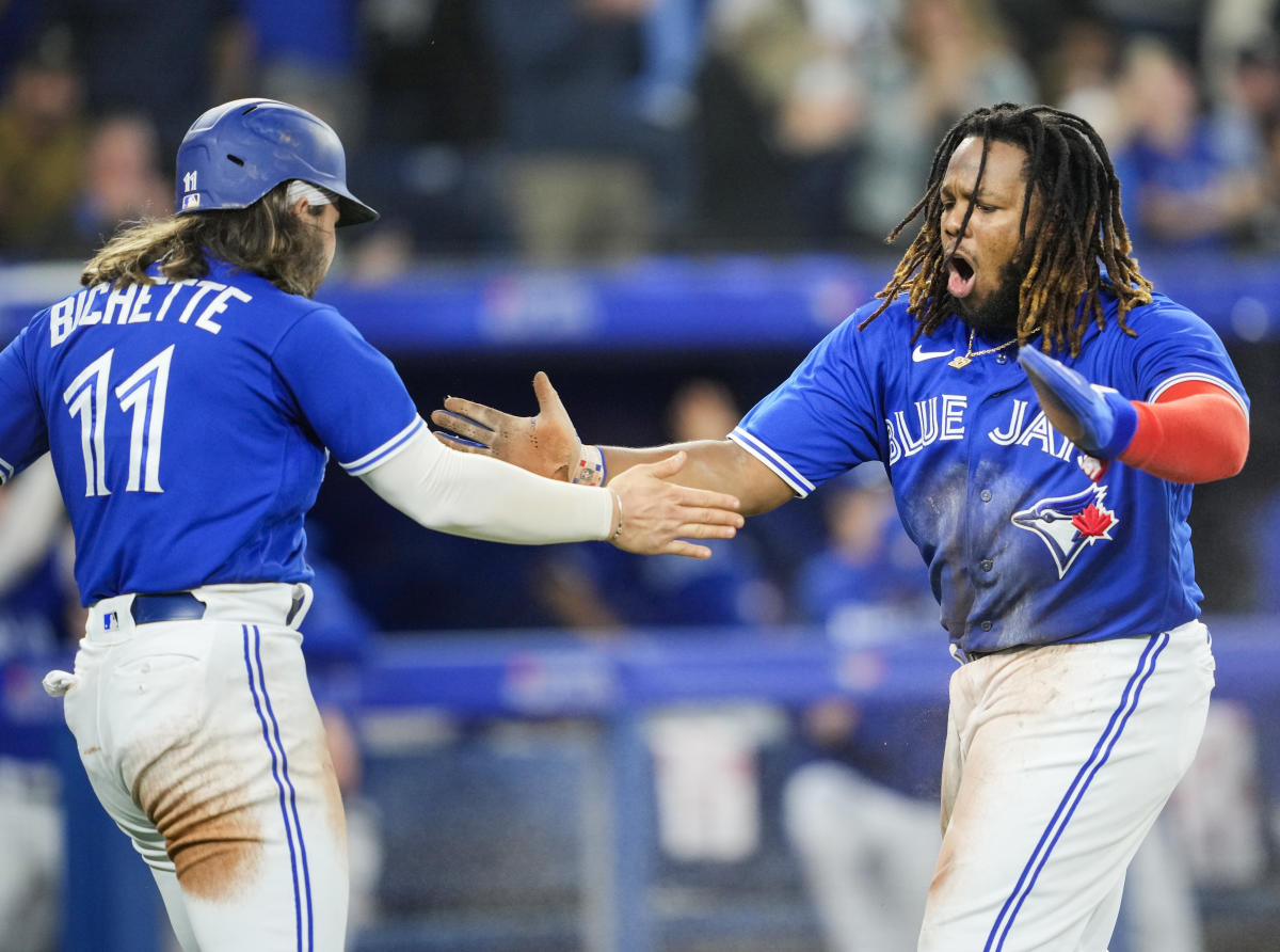 Bo Bichette of the Toronto Blue Jays poses for a photo with family News  Photo - Getty Images