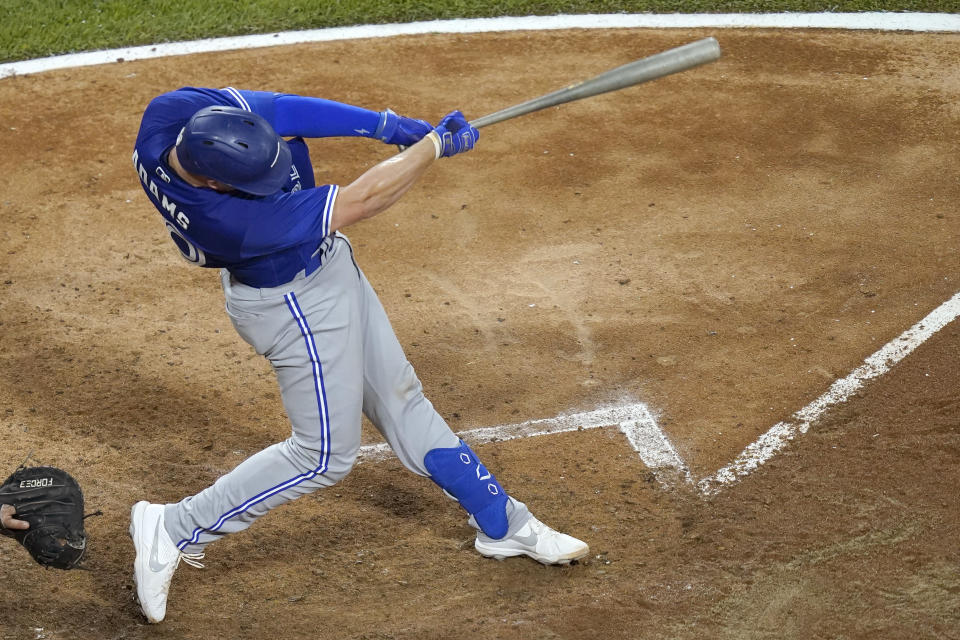 Toronto Blue Jays' Riley Adams doubles off Chicago White Sox starting pitcher Carlos Rodon during the fifth inning of a baseball game Tuesday, June 8, 2021, in Chicago, Adams' first hit in the majors. (AP Photo/Charles Rex Arbogast)