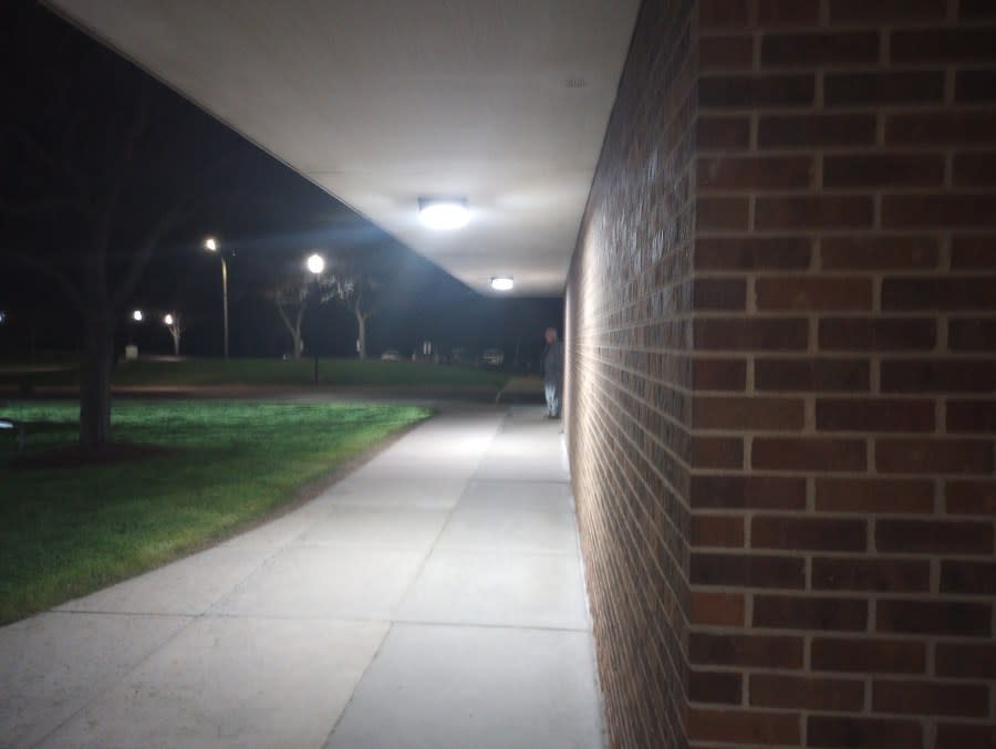 Meridian Township Manager Frank Walsh waiting outside the Municipal building’s Town Hall room Tuesday night. (WLNS)