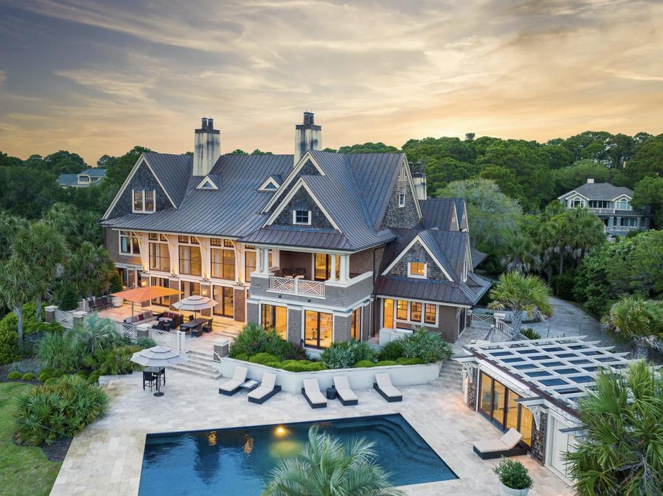 a mansion and swimming pool surrounded by trees in South Carolina