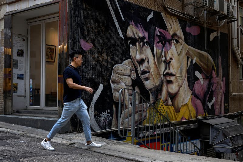 The Wider Image: Fifty years on, Bruce Lee's legacy squares up to modern life in Hong Kong