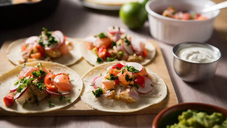 fish tacos on wood surface