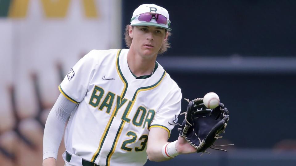 Baylor infielder Kyle Nevin warms up during a game against UCLA in March.