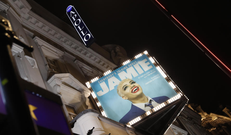 A general view of the exterior of the Apollo Theater, which is preparing to continue its run of the musical "Everybody's Talking About Jamie' in London, Thursday, April 8, 2021. The coronavirus pandemic has devastated British theater, a world-renowned cultural export and major economic force. The theaters in London's West End shut when lockdown began in March 2020, and have remained closed for most of the past 13 months. Now they are preparing, with hope and apprehension, to welcome audiences back. (AP Photo/Alastair Grant)