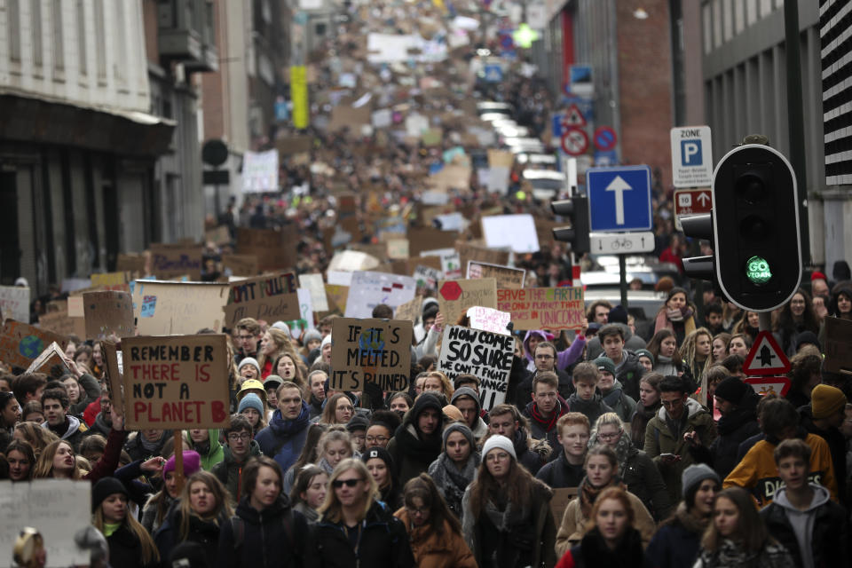 Thousands of youngsters crowd the streets as they march during a climate change protest in Brussels, Thursday, Jan. 31, 2019. Thousands of teenagers in Belgium have skipped school for the fourth week in a row in an attempt to push authorities into providing better protection for the world's climate. (AP Photo/Francisco Seco)