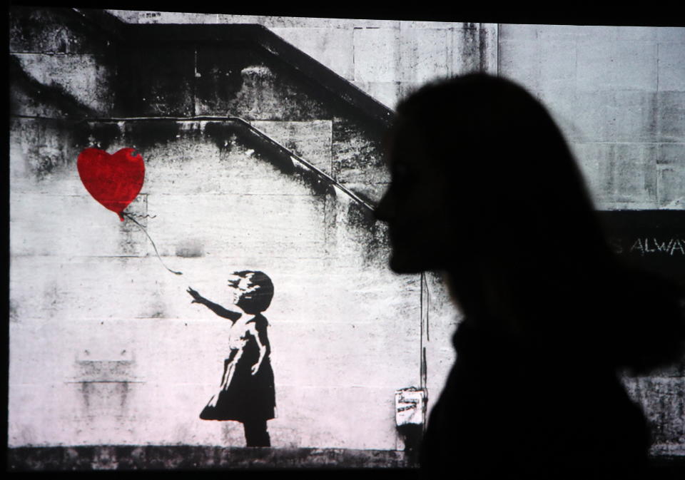 “Girl with Balloon” von Banksy lief bei einer Auktion in London durch den Schredder (Bild: Getty Images)