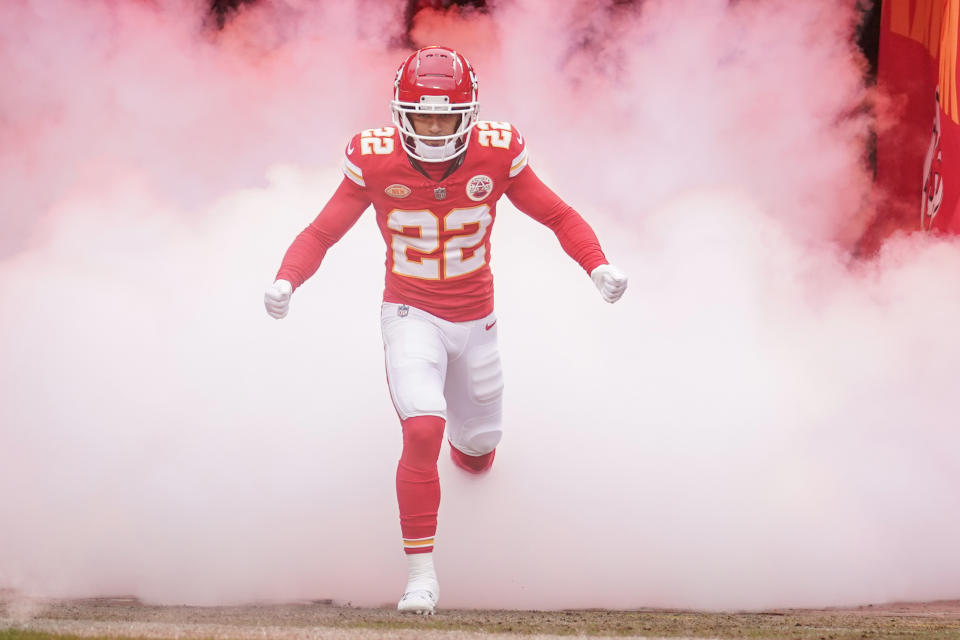 Dec 25, 2023; Kansas City, Missouri, USA; Kansas City Chiefs cornerback Trent McDuffie (22) is introduced against the Las Vegas Raiders prior to a game at GEHA Field at Arrowhead Stadium. Mandatory Credit: Denny Medley-USA TODAY Sports