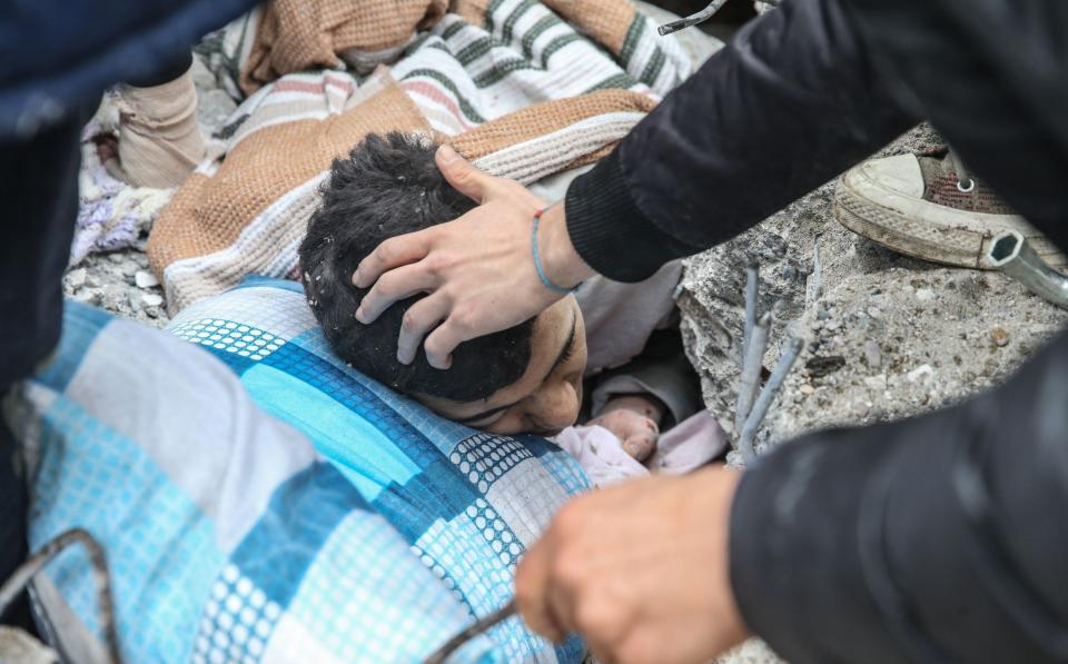 Mehmet Emin Ataoglu rescued under the rubble of 6-storey-building after 7.7 magnitude earthquake hits Iskenderun district of Hatay - Anadolu