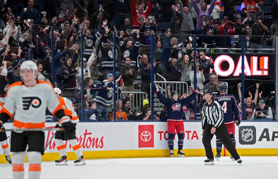 Nov 10, 2022; Columbus, Ohio, USA; Columbus Blue Jackets defenseman Nick Blankenburg (77) celebrates his goal against the Philadelphia Flyers during the third period of their NHL game at Nationwide Arena. 