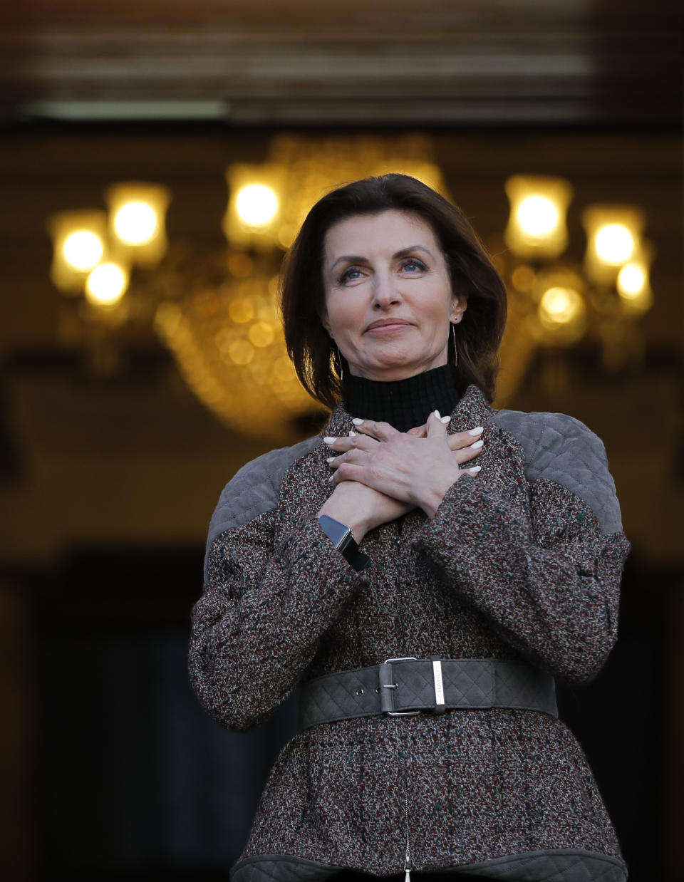 Ukrainian President Petro Poroshenko's wife Maryna greet her husband's supporters who have come to thank him for what he did as a president, in Kiev, Ukraine, Monday, April 22, 2019. Political mandates don't get much more powerful than the one Ukrainian voters gave comedian Volodymyr Zelenskiy, who as president-elect faces daunting challenges along with an overwhelming directive to produce change. (AP Photo/Vadim Ghirda)