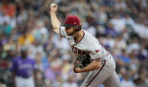 Arizona Diamondbacks starting pitcher Zac Gallen throws in the first inning of a baseball game against the Colorado Rockies in Denver, Saturday, Aug. 13, 2022. (AP Photo/Joe Mahoney)