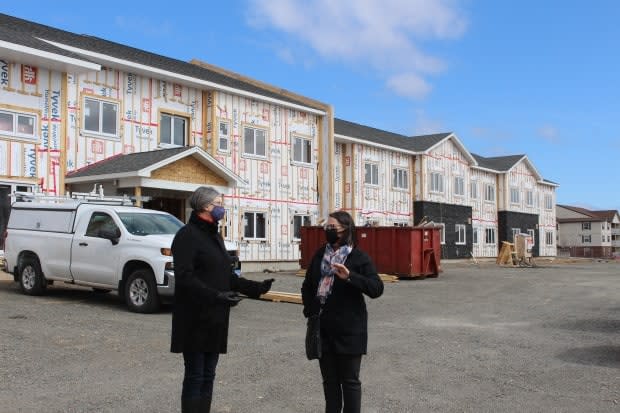 Rev. Shawn Redden of Visions United Church, left, and John Howard Society executive director Joanne Murray are looking forward to opening the Community Hub on July 31. Twenty one-bedroom apartments are located in the right side of the building, while the community spaces are on the left.