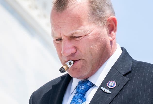 Rep. Troy Nehls (R-Texas) is seen on the House steps of the U.S. Capitol, June 16, 2022. A military badge affixed to his suit lapel implies he served as a combat infantryman, though his service record shows no such deployment.