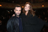 La femme de Nicolas Sarkozy, Carla Bruni, était accompagnée de Nicolas Ghesquière, le directeur artistique de chez Louis Vuitton.