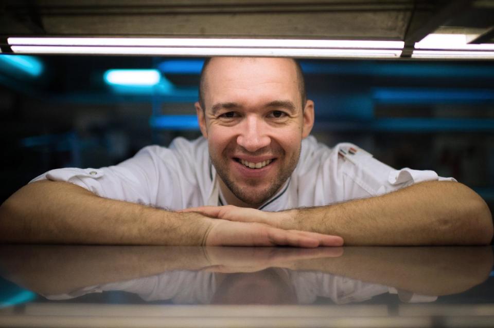 Guillaume Gomez, the new head chef at the Elysee Palace, poses for photographers in the kitchens at the Elysee Palace in Paris, France, Thursday, Oct. 31, 2013. Guillaume Gomez replaces France’s presidential chef, Bernard Vaussion, 60, who retired after four decades of culinary service. (AP Photo/Martin Bureau, pool)