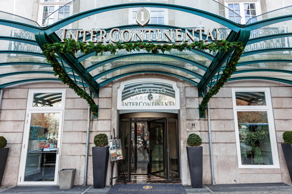 Porto, Portugal - January 5, 2015: Entrance of the Palacio das Cardosas Intercontinental Hotel facing the Aliados Avenue and Liberdade Square. A five stars hotel.