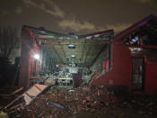 The Geist restaurant brick wall collapsed in a tornado that touched down in downtown Nashville, Tuesday, March 3, 2020. (Alex Carlson via AP)