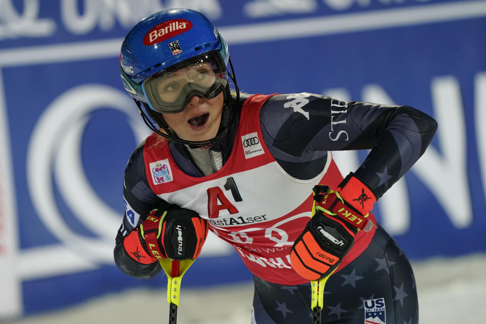 United States' Mikaela Shiffrin looks at the scoreboard after completing an alpine ski, women's World Cup slalom in Flachau, Austria, Tuesday, Jan.10, 2023. American skier Mikaela Shiffrin finished second to Olympic champion Petra Vlhova in a night slalom race Tuesday, meaning she will have to wait for another chance to break the record for most wins on the women’s World Cup circuit. (AP Photo/Giovanni Auletta)