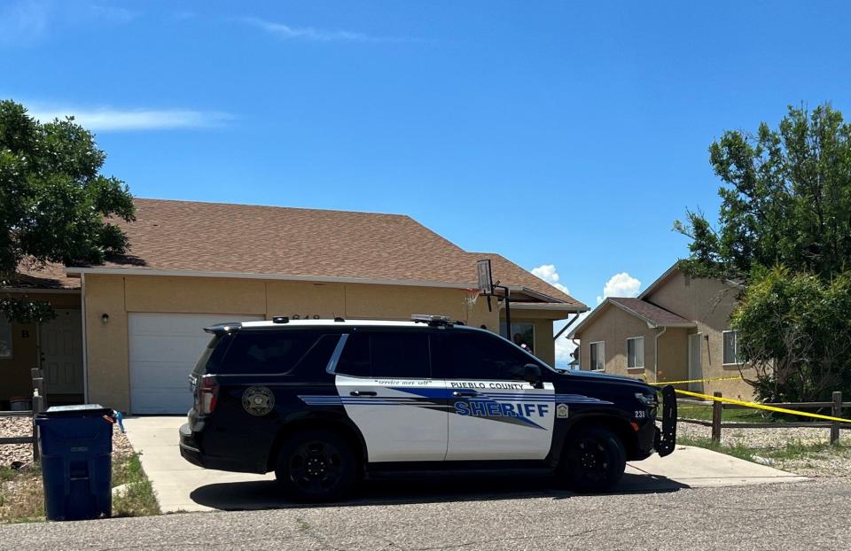 A Pueblo County Sheriff's Office vehicle sits in front of the Pueblo West home of Hailey Perkins on June 27, 2022. The PCSO initially declared the teenager's death "suspicious" but later elevated its investigation to a homicide.