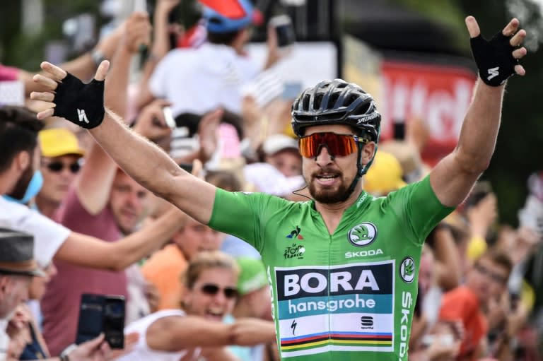 Slovakian Peter Sagan raises his arms in triumph at the end of stage five on the Tour de France