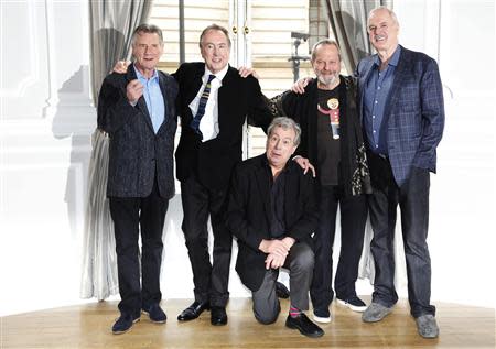 The surviving members of the original cast of the Monty Python comedy team (L-R) Michael Palin, Eric Idle, Terry Jones, Terry Gilliam and John Cleese, pose for photographers at a photocall in central London November 21, 2013. REUTERS/Luke MacGregor