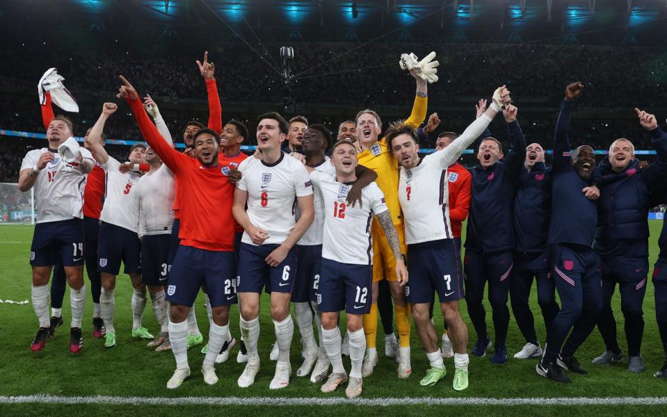 Players of England celebrate their side's victory towards the fans after the UEFA Euro 2020 Championship Semi-final match between England and Denmark at Wembley Stadium - Eddie Keogh/The FA via Getty Images