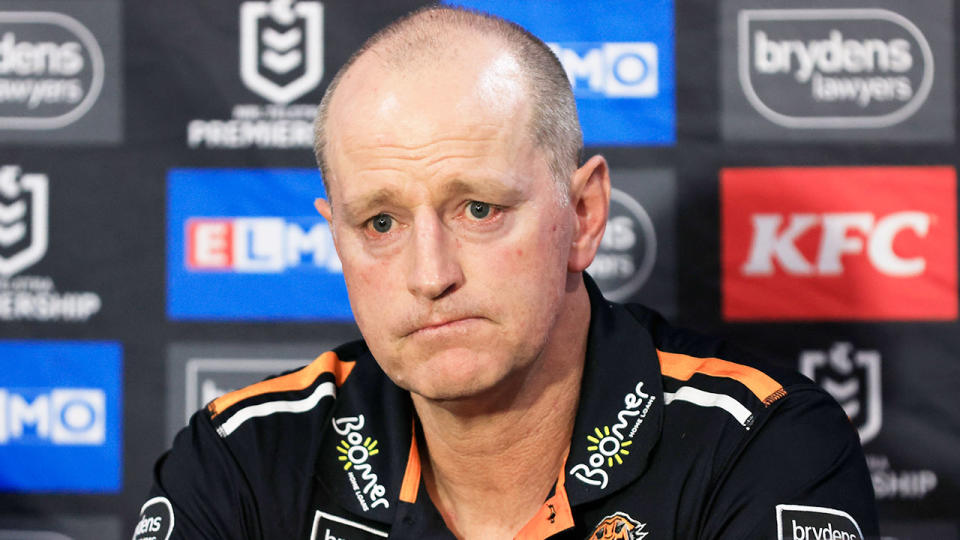 Seen here, a solemn looking Wests Tigers coach Michael Maguire after his side's fifth straight loss in the 2022 NRL season.