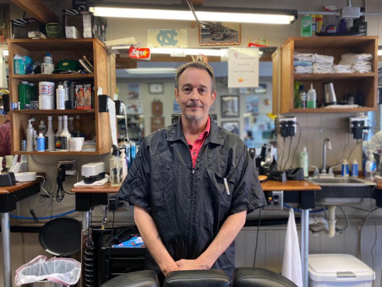 Ronnie Lamb, 53, lives in Robeson County and cuts hair with his brother at Lumberton Barber Shop. Lamb is a registered unaffiliated voter, but conservatism has always been at his core.