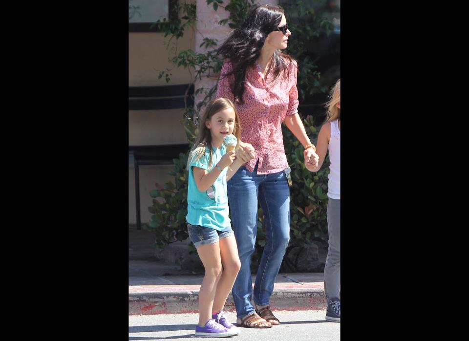 Courteney Cox takes her little lady, Coco and a friend, for an ice cream break in Malibu.