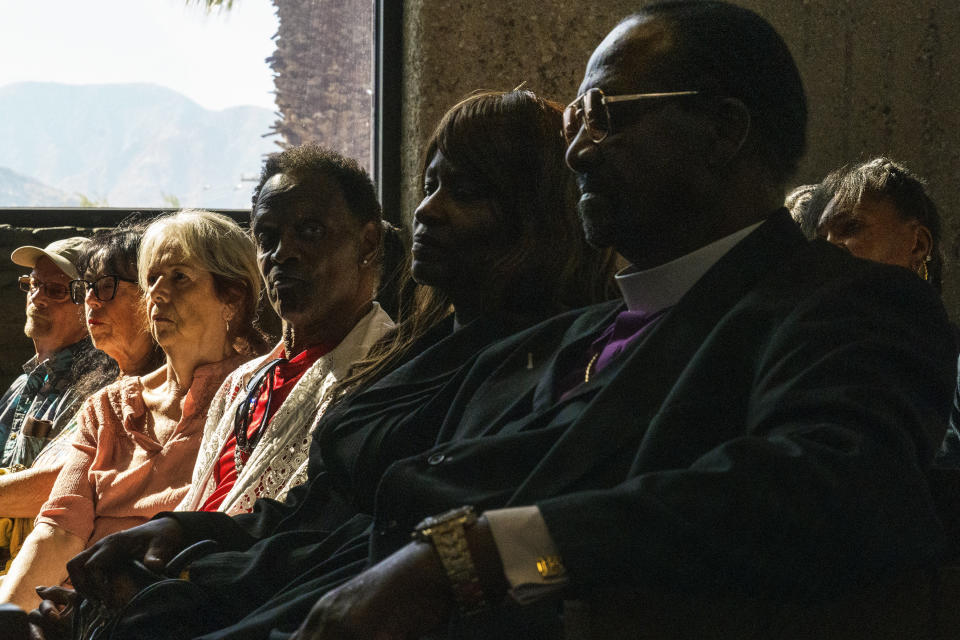 Survivors and descendants of Palm Springs Section 14 residents gather at the United Methodist Church in Palm Springs, Calif., Sunday, April 16, 2023. Black and Latino Californians who were displaced from their Section 14 neighborhood in Palm Springs allege the city pushed them out by hiring contractors to destroy homes in an area that was tight-knit and full of diversity. (AP Photo/Damian Dovarganes)