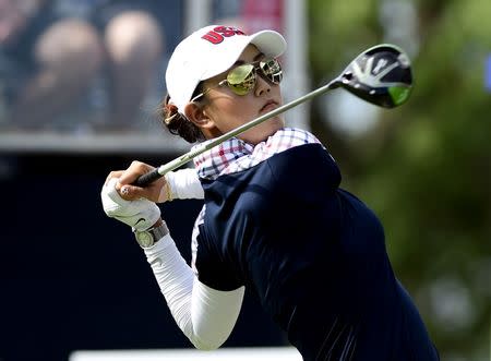 FILE PHOTO: Aug 20, 2017; West Des Moines, IA, USA; USA golfer Michelle Wie tees off on the first hole in the final round of The Solheim Cup international golf tournament at Des Moines Golf and Country Club. Mandatory Credit: Thomas J. Russo-USA TODAY Sports