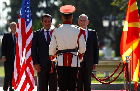 Macedonian Prime Minister Zoran Zaev and U.S. Secretary of Defense James Mattis attend a welcoming ceremony in Skopje, Macedonia September 17, 2018. REUTERS/Ognen Teofilovski