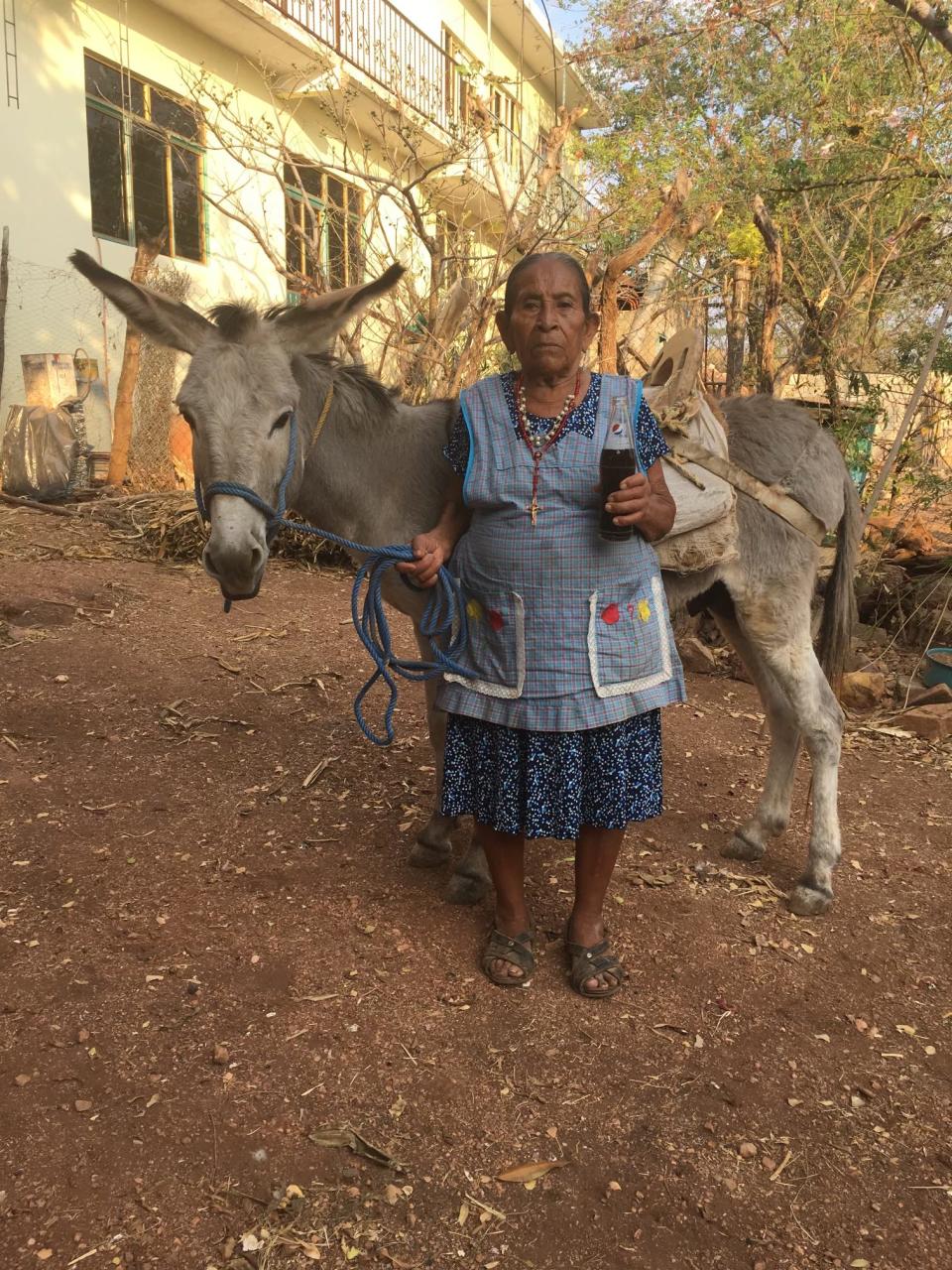 This portrait of Roberta Valle, whom family call Mama Beta, standing outside her home in Tepetlapa, Guerrero, Mexico, greeted guests at Cafe Fiesta, which closed after 29 years.